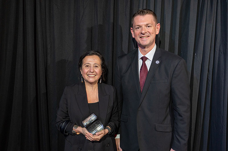 Indira Palacios-Valladares with Dean Shawn Wahl.