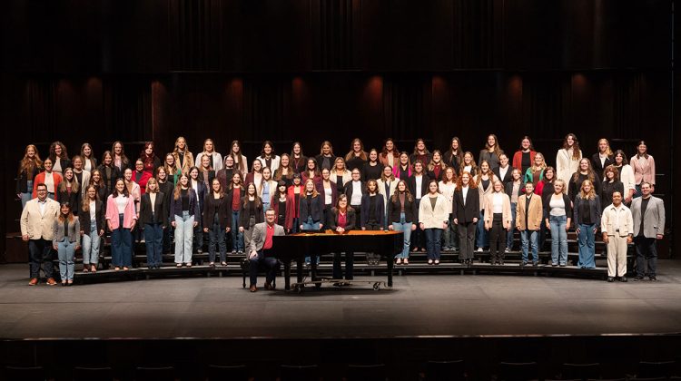 A women's chorus on stage