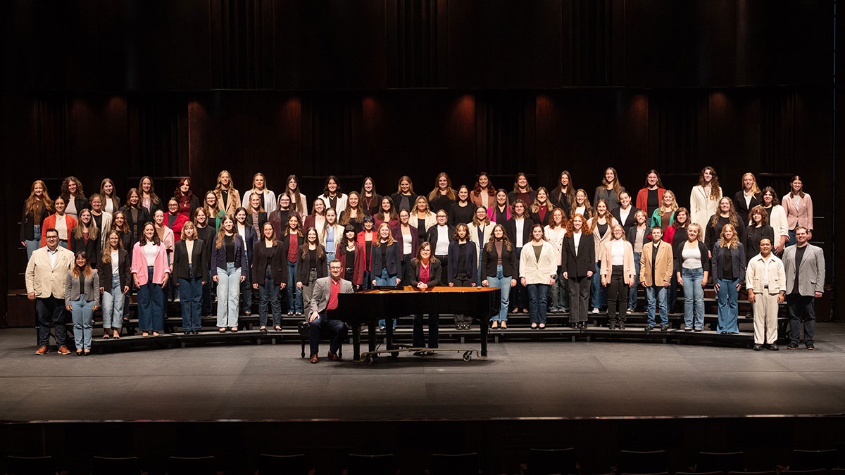 A women's chorus on stage