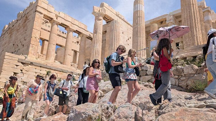 Group of people walking near the Acropolis