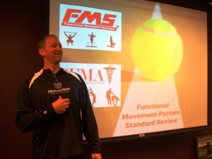 Brandon Hetzler kicking off the workshop with the FMS scoring review.