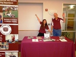 SMAT 4th year student, Abby Eckert attempting transfer her high energy to SMAT faculty, Gary Ward at the Showcase event.