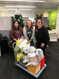 Members of the DOSA Social Committee Deliver Food to the Bear Pantry