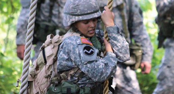 Military science student engaged in training
