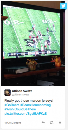 Alumna watching Bears football on TV