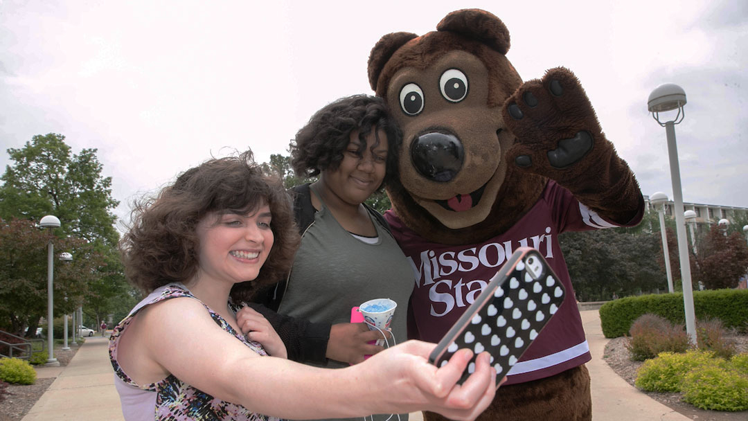 Boomer with students