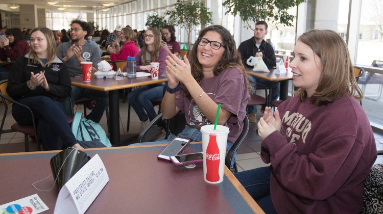 New media specialist interns, Mary Kay Gagnepain and Abby Blaes, laughing in the PSU at Missouri State's 113th birthday party.