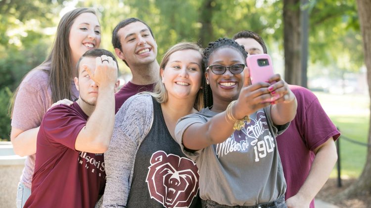 Missouri State students taking a group selfie.